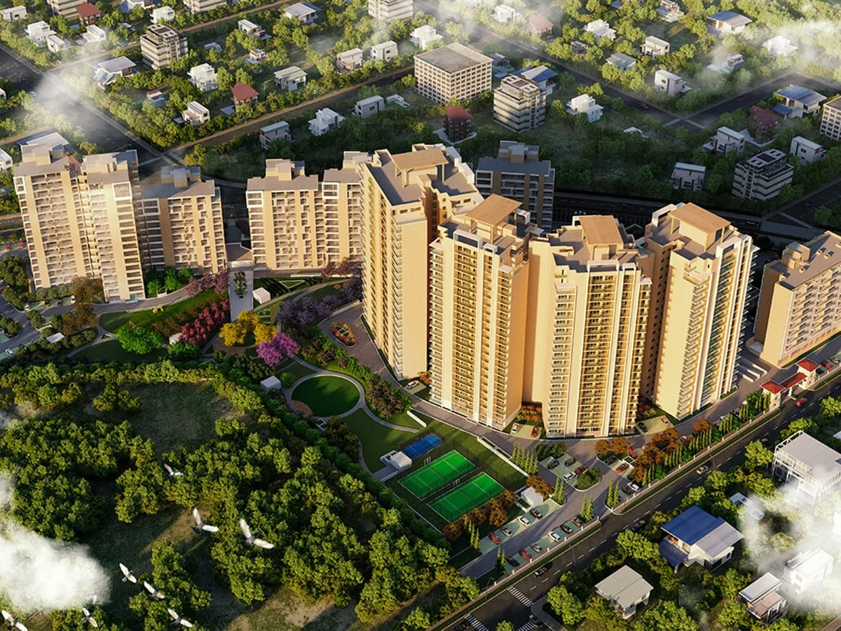 Aerial view of Wave Gardens 4 BHK towers and landscaping