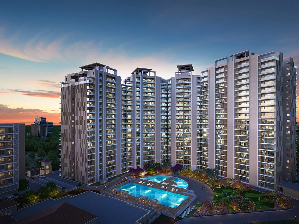 Wave Gardens 3 BHK tower elevation at dusk